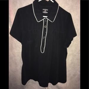 Buttoned, collared navy blue shirt.